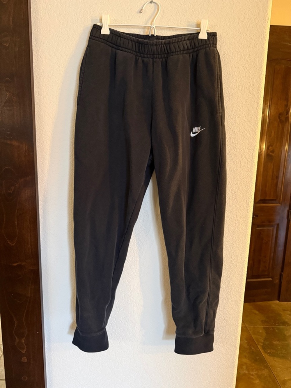 Nike Kids Black Jogger Sweatpants with White Swoosh